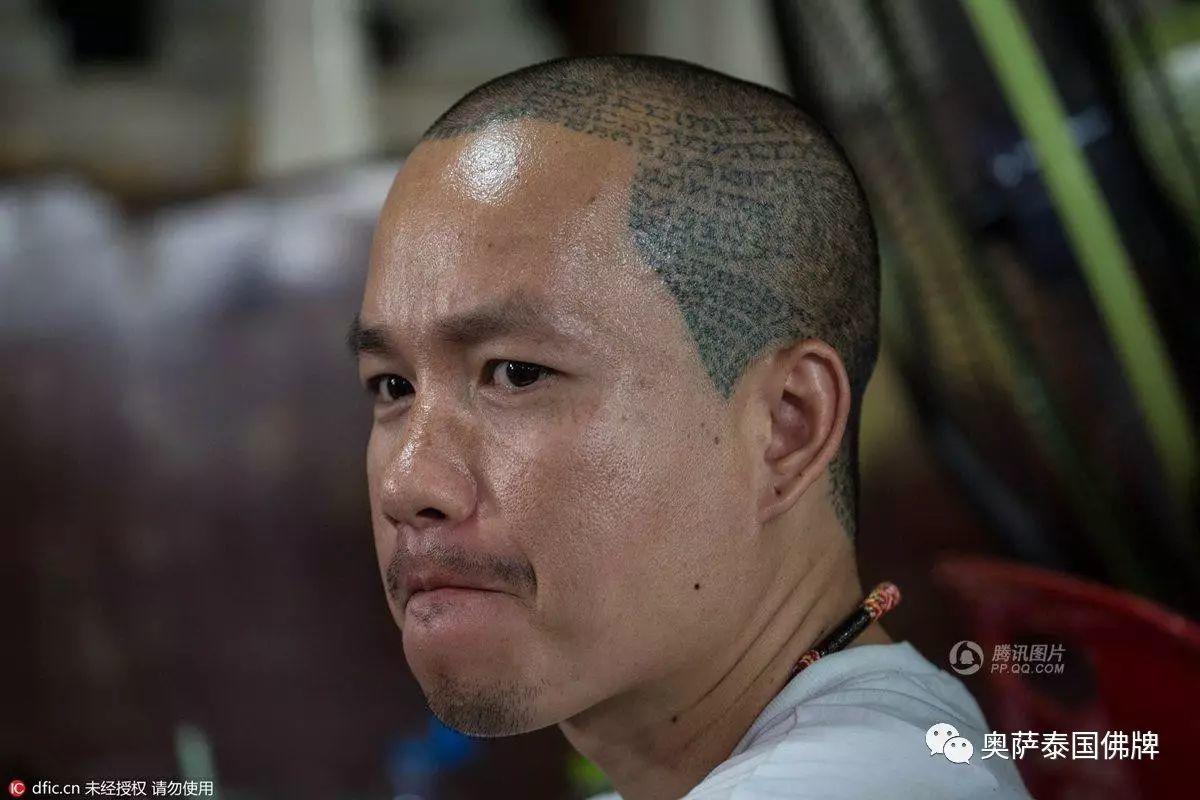泰国佛教徒用钢针刺肉纹身-图片4